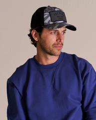 western goods trucker hat