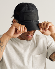 western goods trucker hat