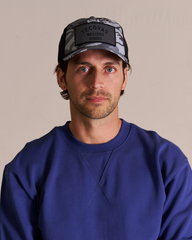 western goods trucker hat